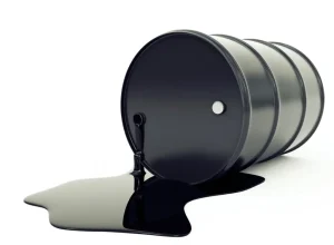 569e8f6b0e21630a3e0f2013bigstock-oil-barrel-and-pool